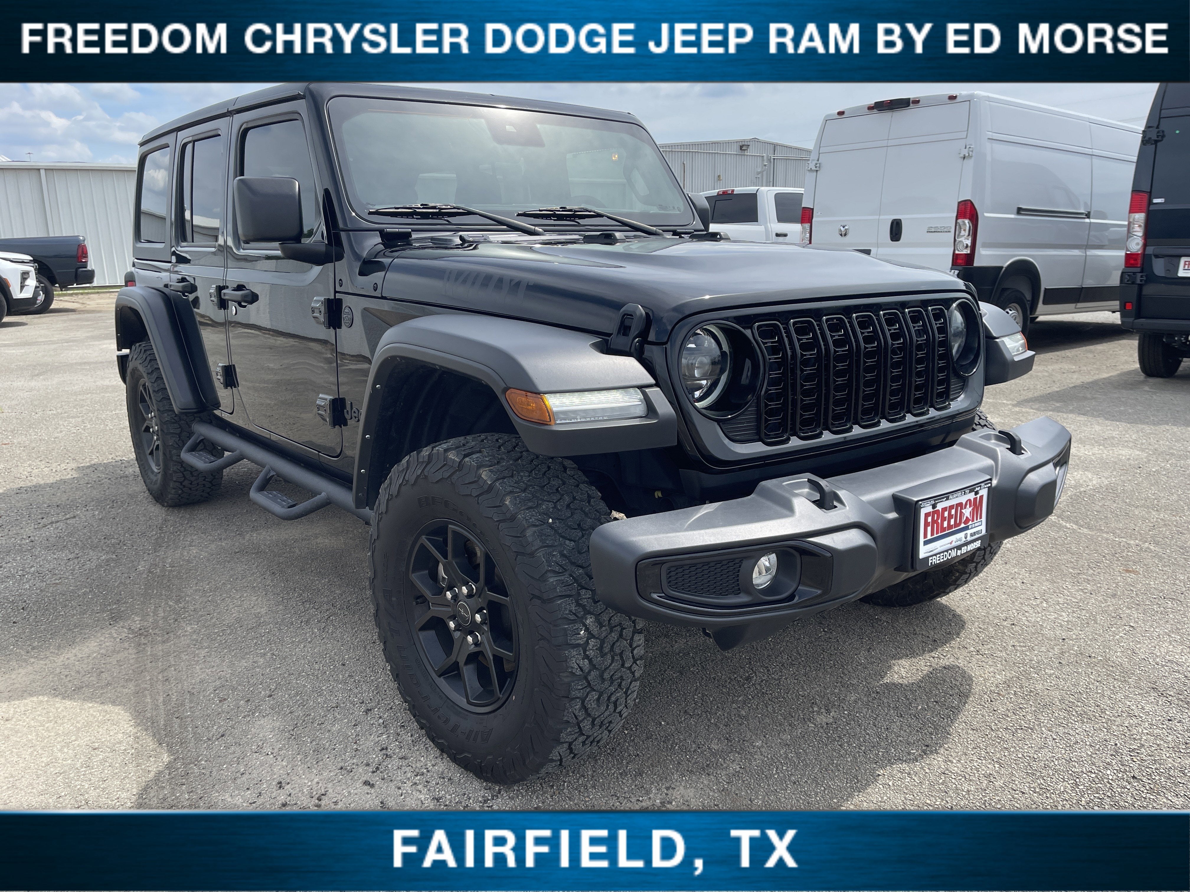 2024 Jeep Wrangler Willys in Black Clearcoat — front three-quarter view
