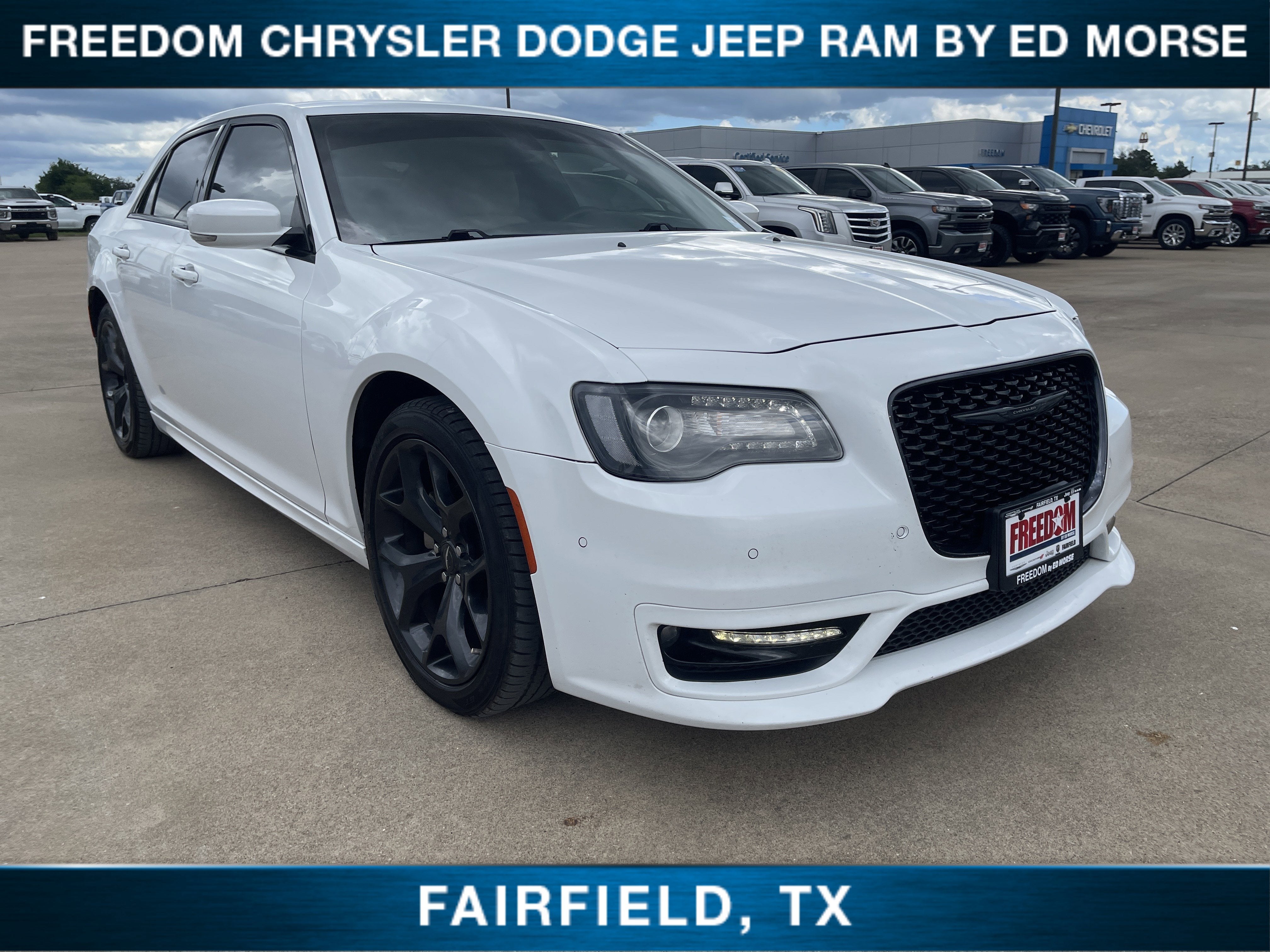 2023 Chrysler 300 Touring L in Bright White Clearcoat — front three-quarter view