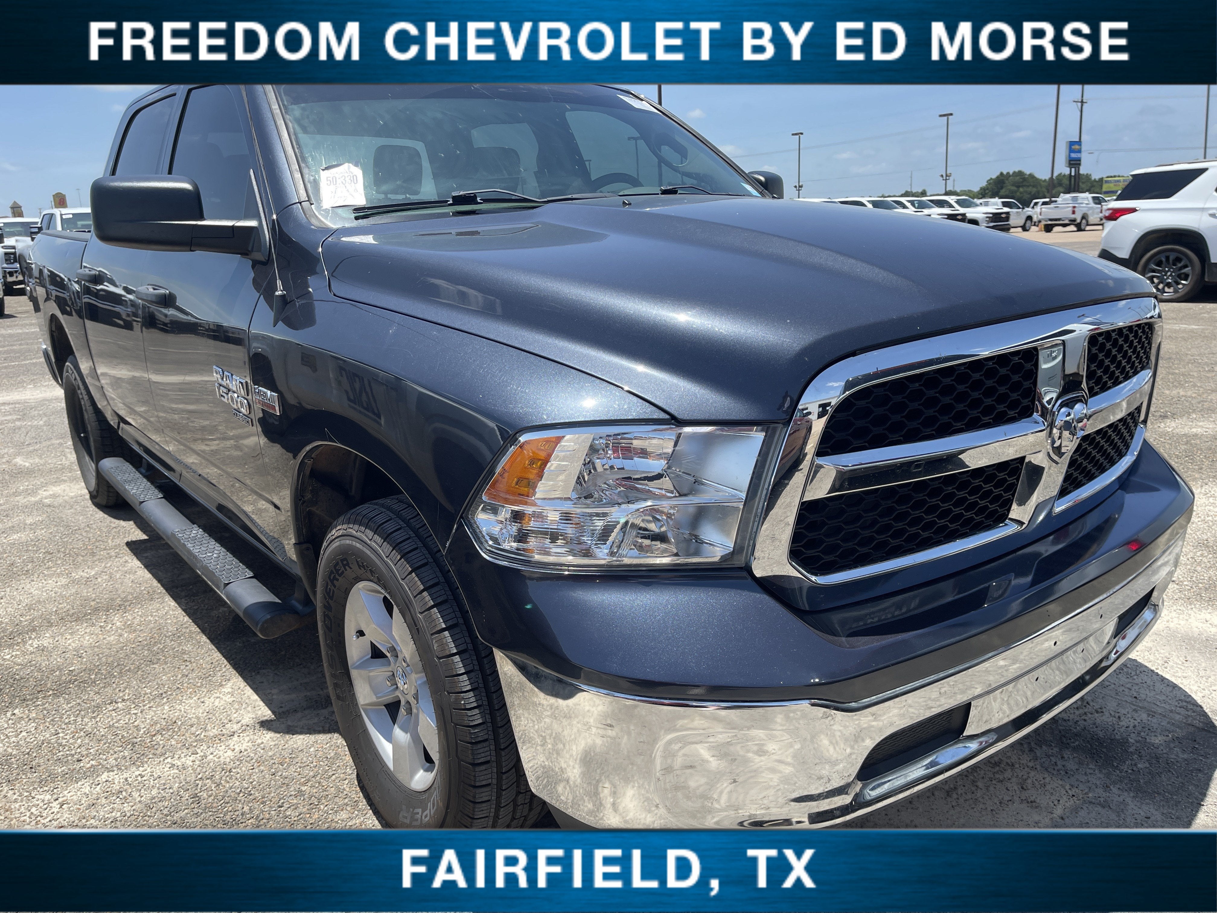 2019 RAM 1500 Classic Tradesman in Met/Met — front three-quarter view