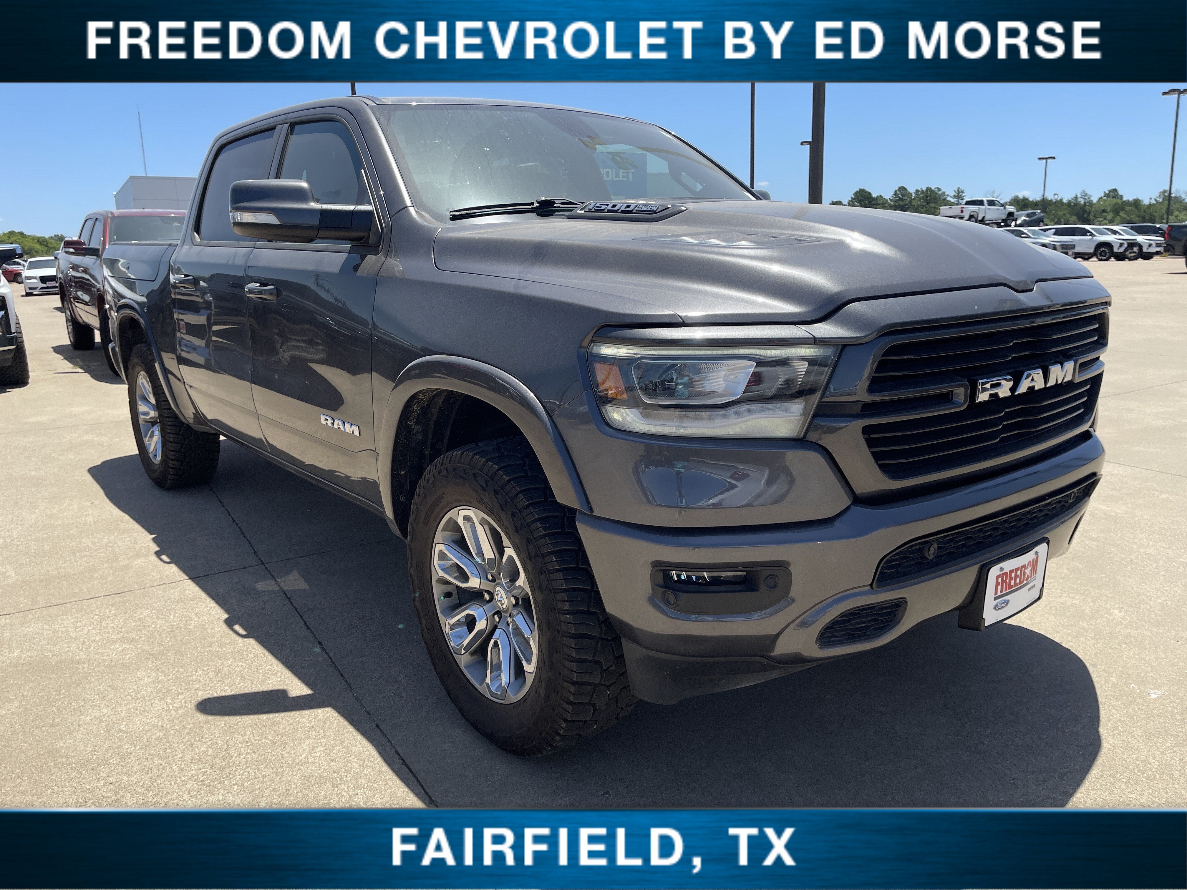 2020 RAM 1500 Laramie in Met/Met — front three-quarter view