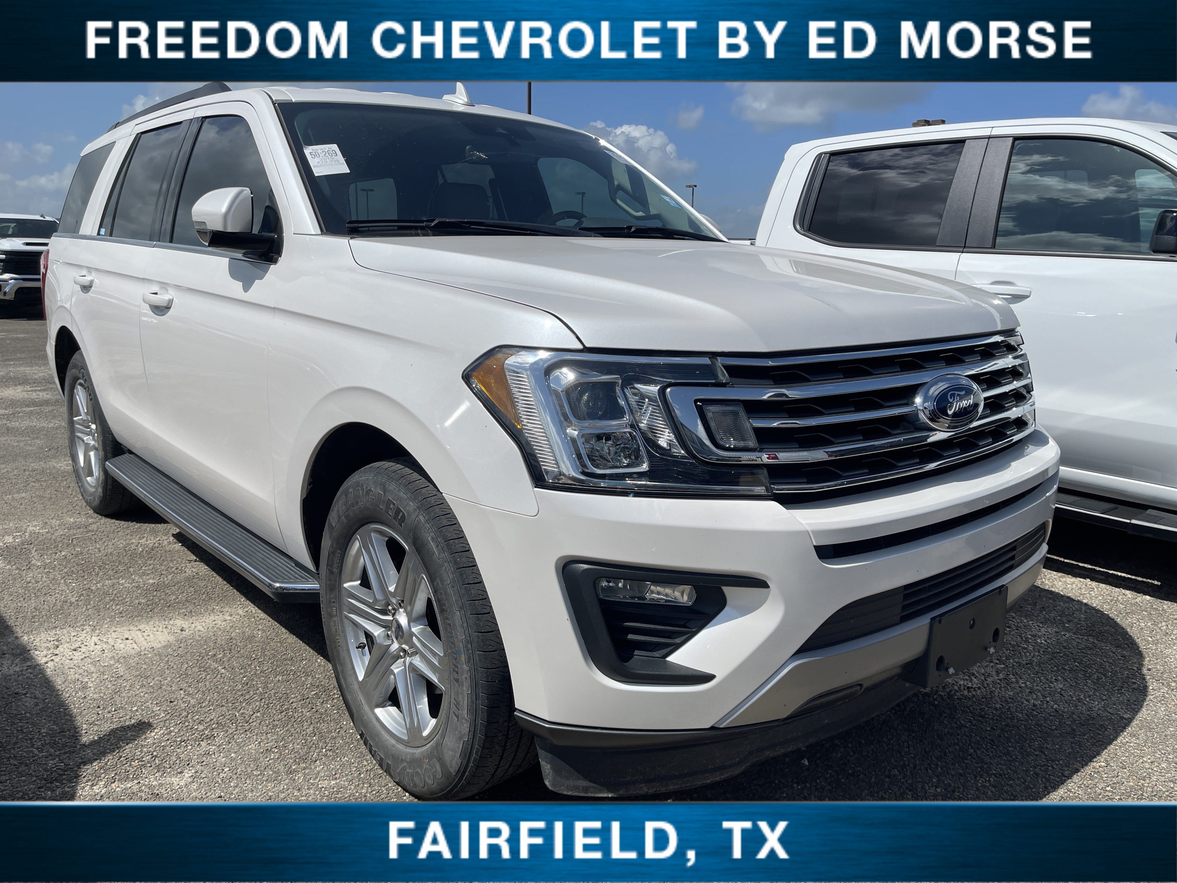 2019 Ford Expedition XLT in Whi/White — front three-quarter view