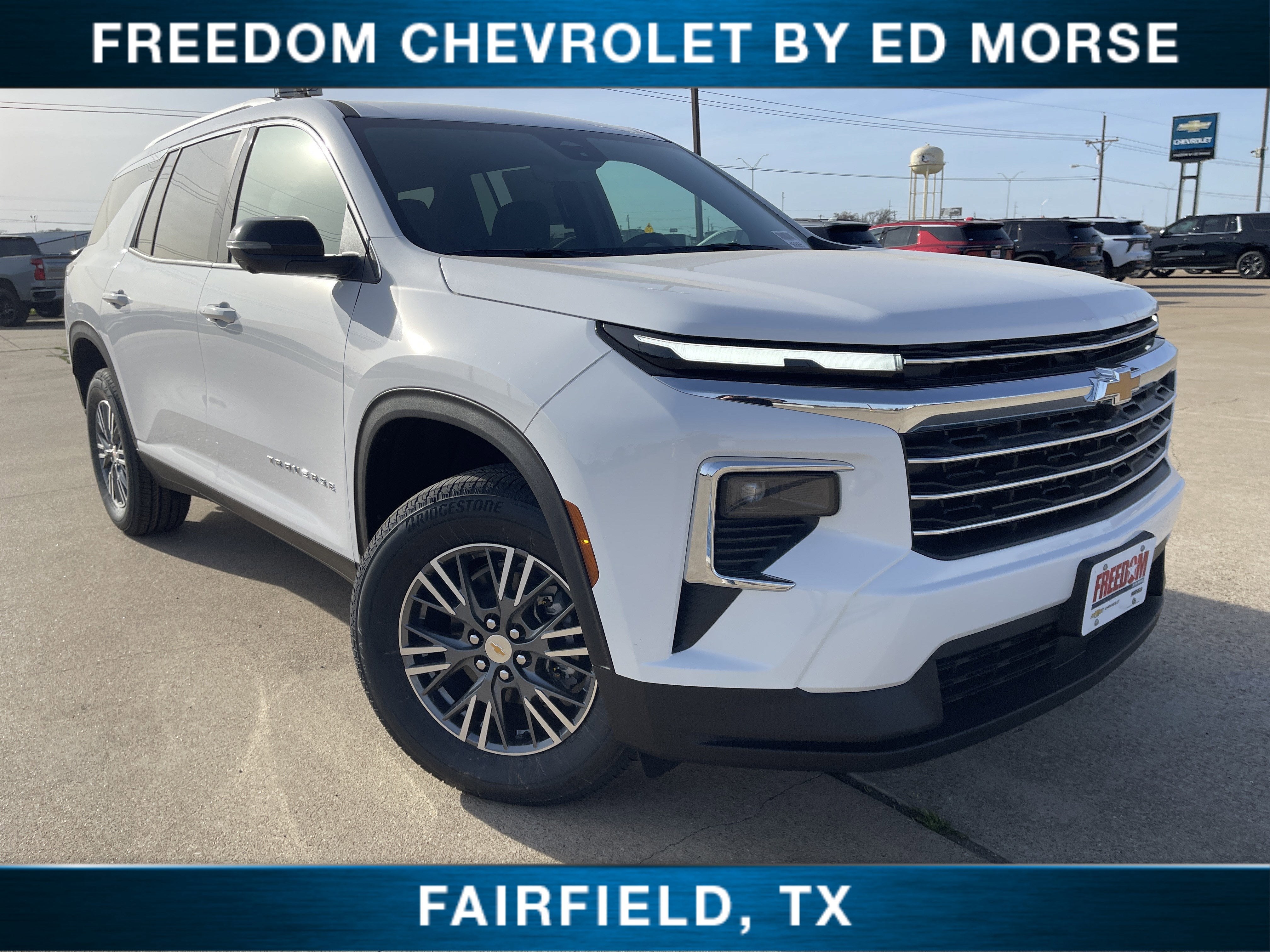 2026 Chevrolet Traverse LT in Summit White — front three-quarter view