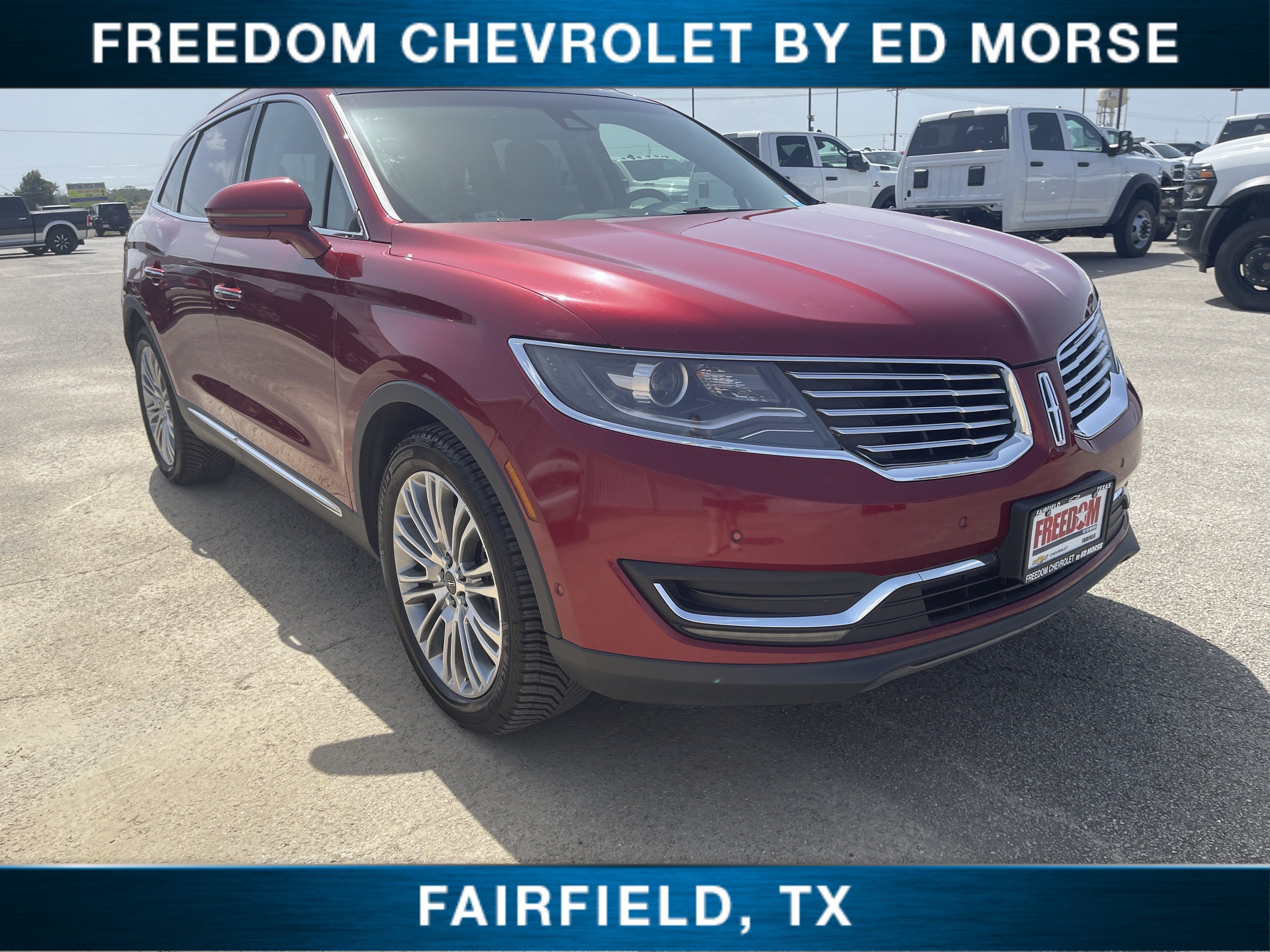 2018 Lincoln MKX Reserve in Red/Red — front three-quarter view