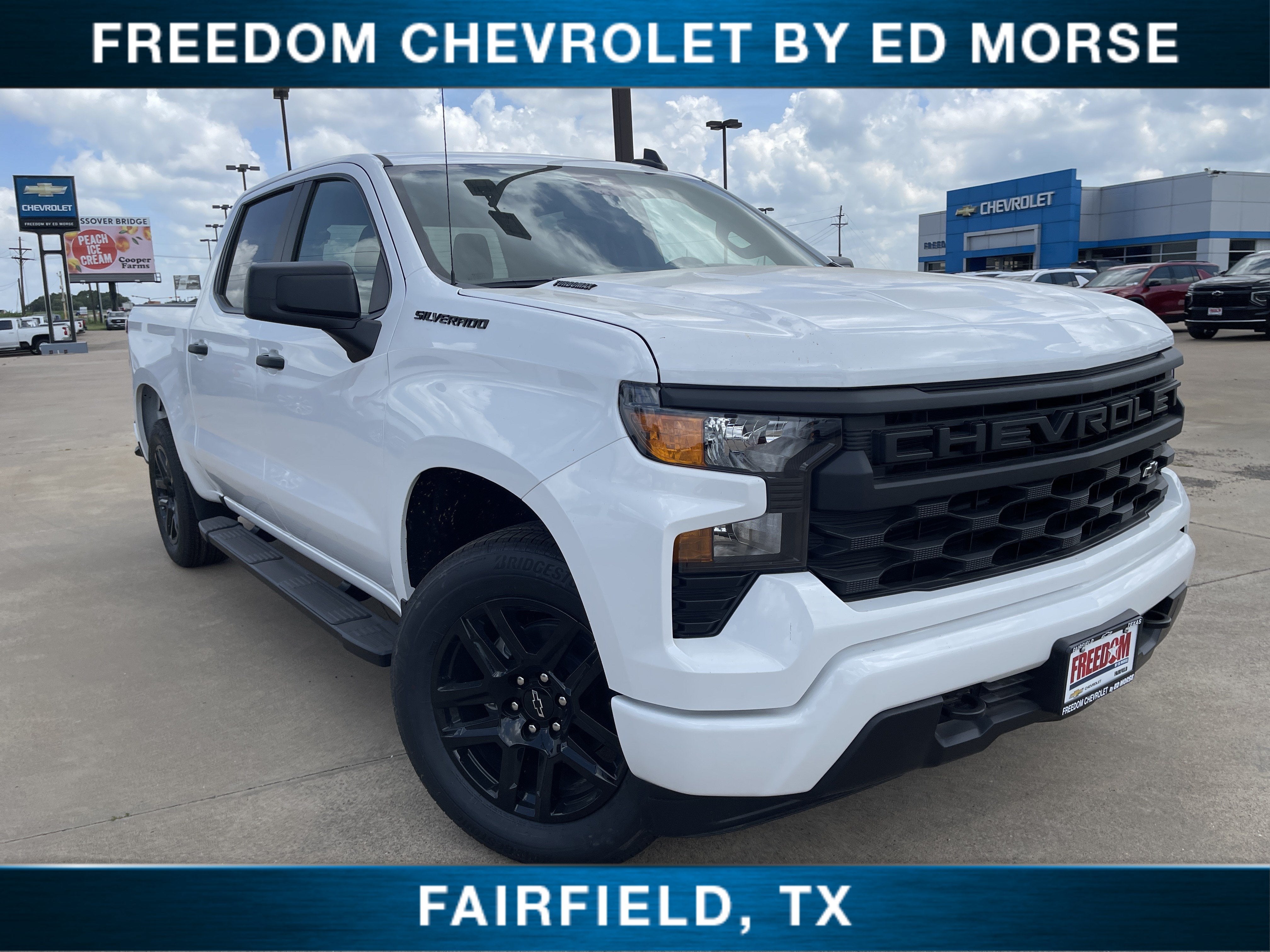 2026 Chevrolet Silverado 1500 Custom in Summit White — front three-quarter view