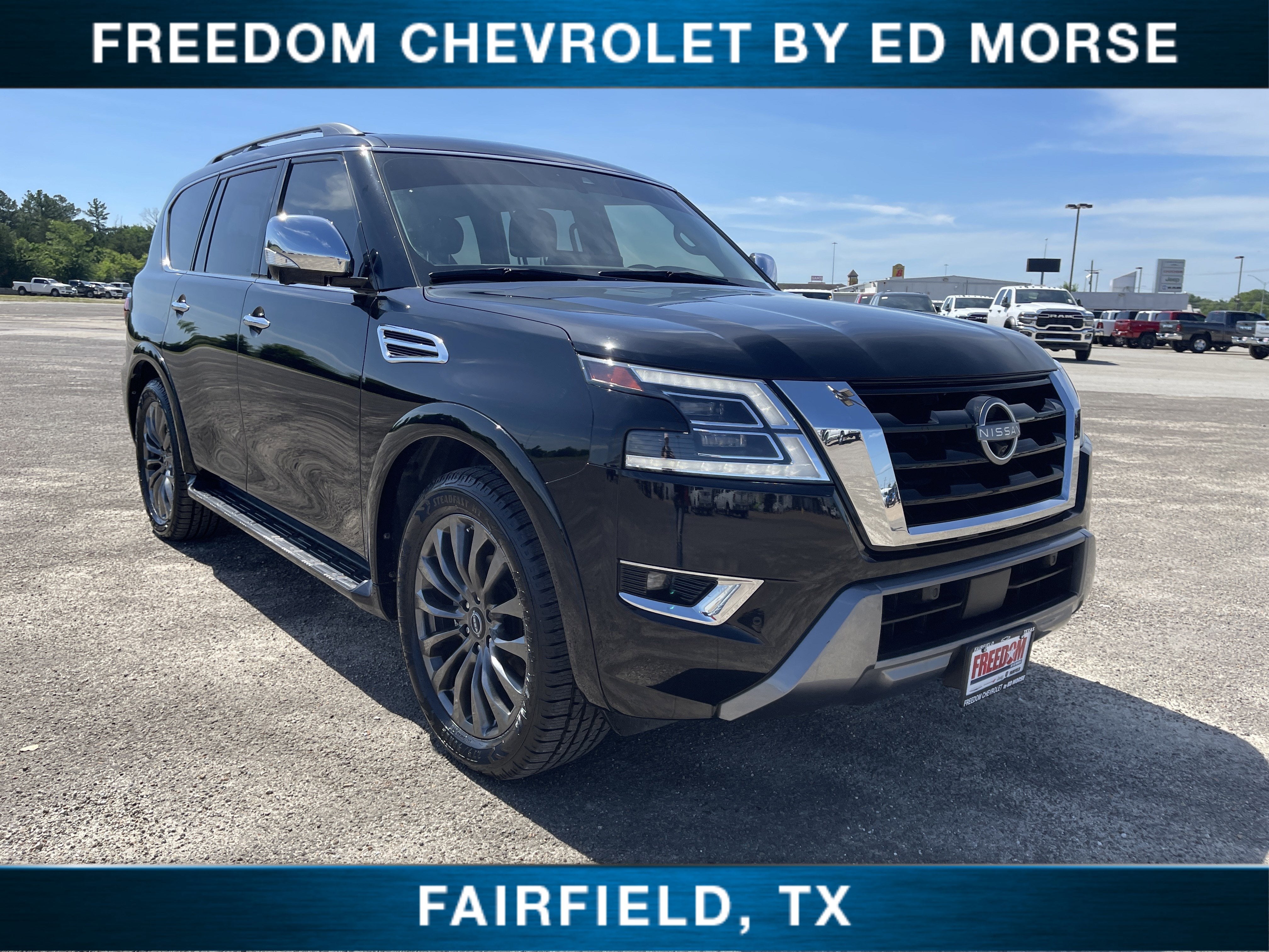 2024 Nissan Armada Platinum in Black — front three-quarter view